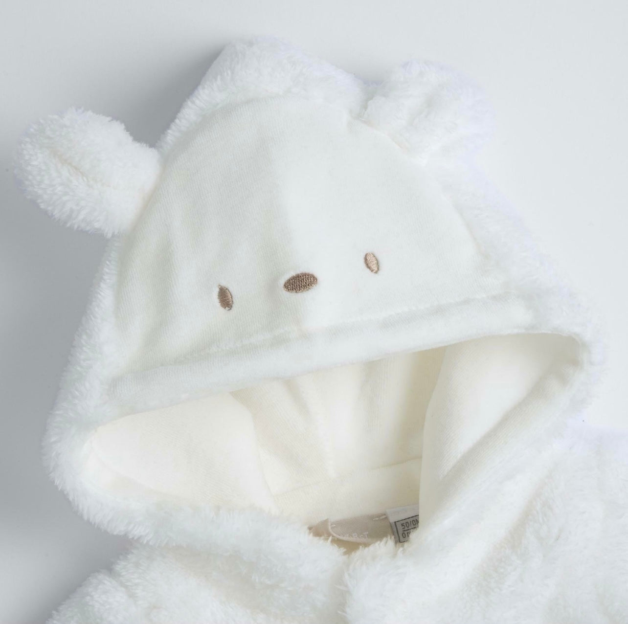 Chicco tutina bianca aperta avanti